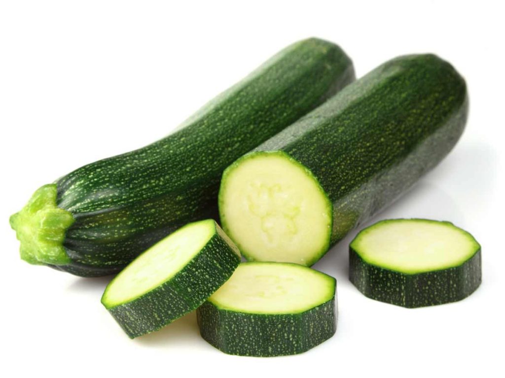 two cucumbers with three slices cut off