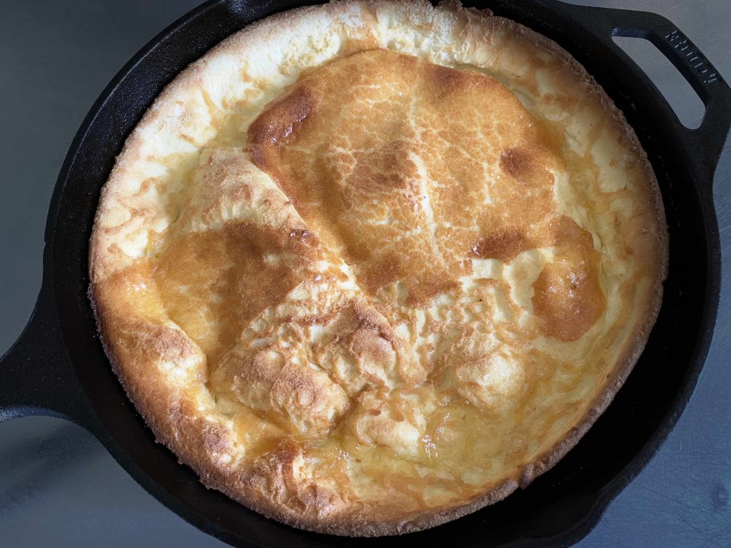 finished keto dutch baby in skillet