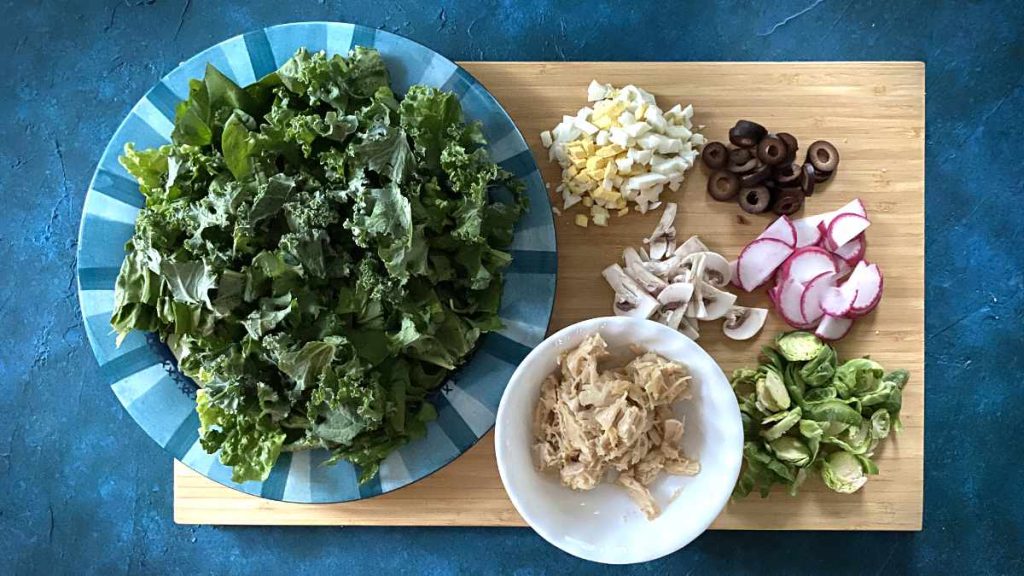 keto salad ingredients on cutting board