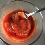 ketchup in bowl with spoon