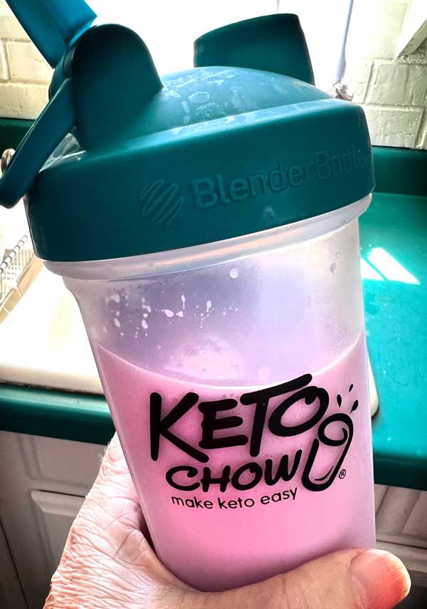 Raspberry keto chow in blender bottle