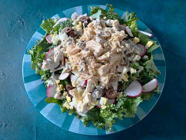 Keto friendly salad vegetables and chicken on salad plate