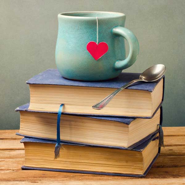 teacup on book stack